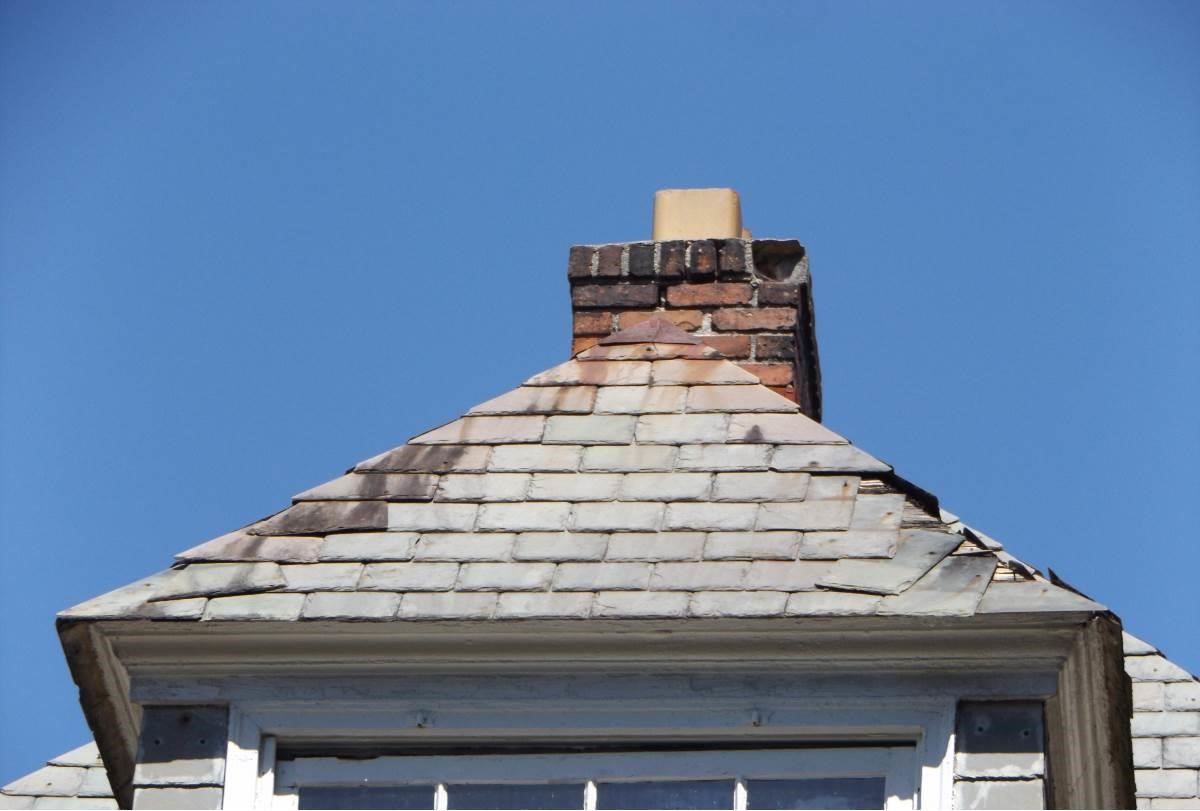 Damaged Chimney and Roof